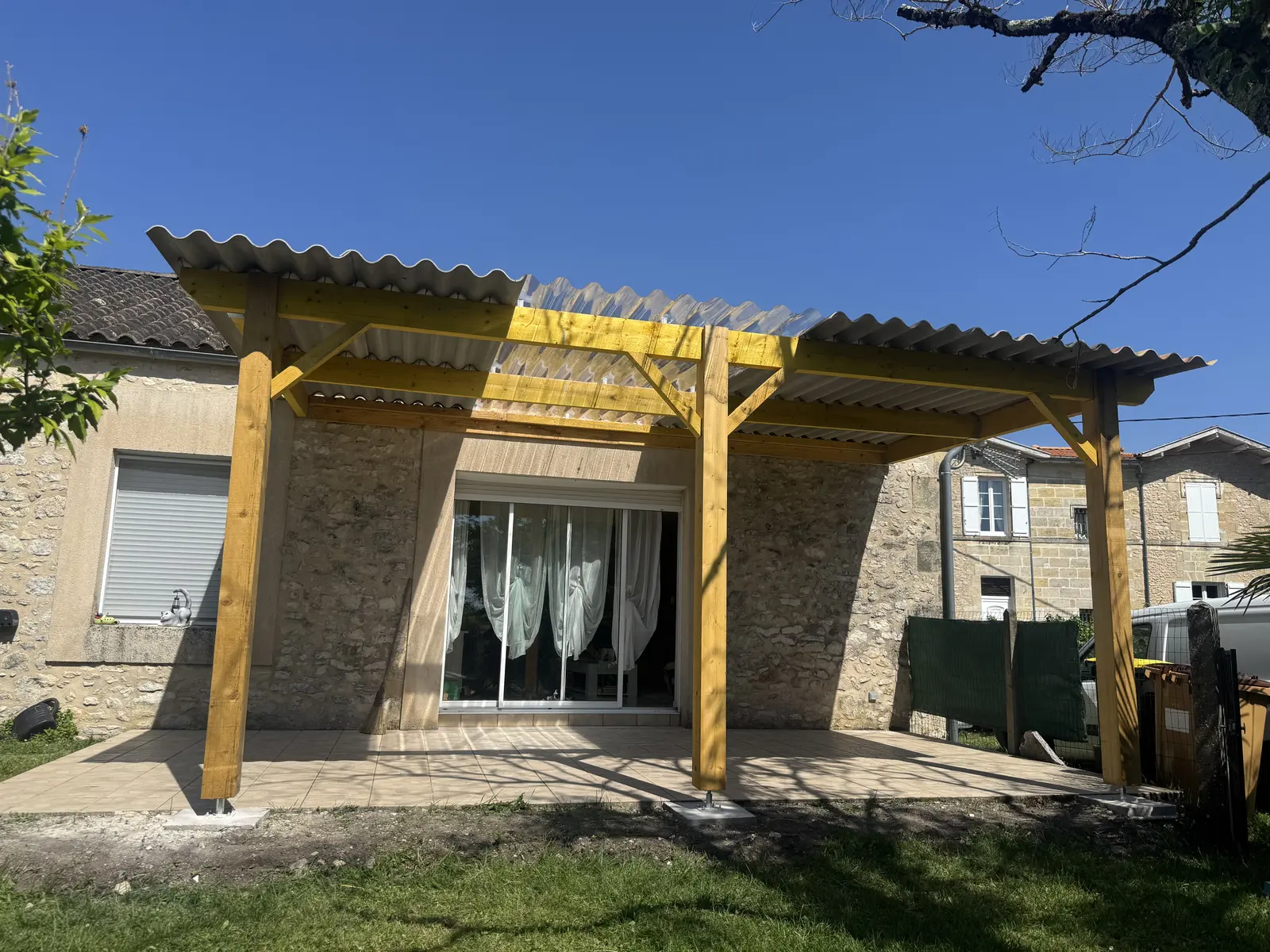 Auvent de terrasse en ossature bois réalisé par Bati'bat